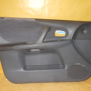 Обшивка двери Mazda Familia BJ5W перед, лев