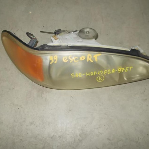 Фара Ford Escort '1997-2002 прав USA