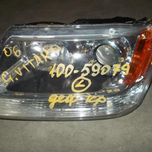 Фара SUZUKI лев Grand Vitara TD54W '2008 (деф.крепл.)