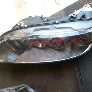 Фара Mazda лев 6 '2003 USA (внутри пыль)