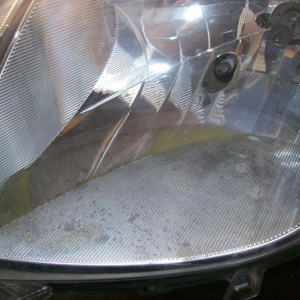 Фара TOYOTA лев Vitz KSP90 '2005-2007 деф.отраж.