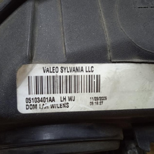 Фара Jeep Grand Cherokee WJ/WG '1999-2004 лев USA тёмная, жёлтый поворотникAA