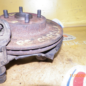 Ступица Toyota AE100/AE101/AE110/AE111/EE110/EE111/AE104/AE114/AE115 Corolla/Sprinter перед, лев 2WD/4WD Суппорт-(54-22).Без ABS.В сборе.Диаметр диска- 258мм