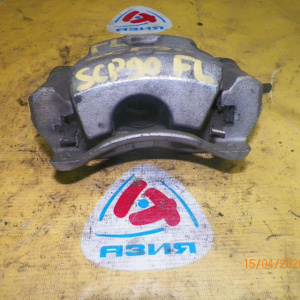 Суппорт Toyota KSP90/SCP90 Vitz/Belta перед, лев