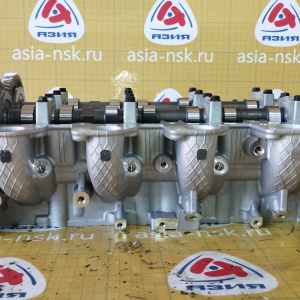 Головка блока Mitsubishi 4D56U L200 '2007- НОВАЯ с распредвалами 1005B453