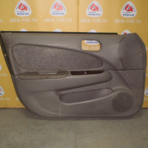 Обшивка двери Toyota Corolla AE110 перед, лев