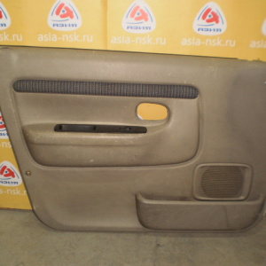 Обшивка двери Mazda Demio '1996-1998 DW3W перед, лев