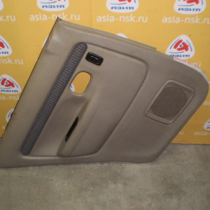 Обшивка двери Mazda Demio DW3W '1996-1999 зад, лев