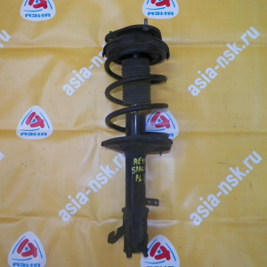 Стойка TOYOTA AE111 Corolla Spacio перед, лев