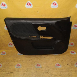 Обшивка двери Nissan Note E11 перед, лев