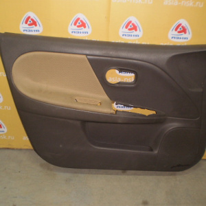 Обшивка двери Nissan Note E11 перед, лев