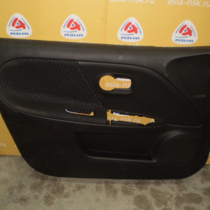 Обшивка двери Nissan Note E11 перед, лев