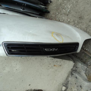 Капот Toyota Corona Exiv ST202 ф.20-340 с решеткой дефект