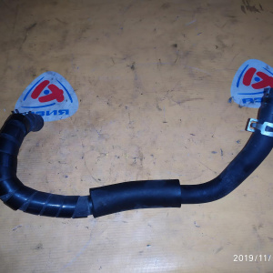 Патрубок радиатора печки Toyota 87245-2D260 Carina ED ST200 3S-FE/4S-FE '08.1995- ВЕРХ, с головки на кран печки ( катушечный = трамб. )