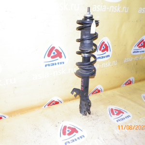 Стойка Nissan K13 March перед, лев