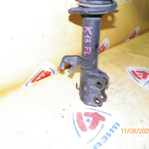 Стойка Nissan K13 March перед, лев