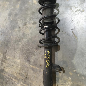 Стойка Nissan K13 March перед, лев