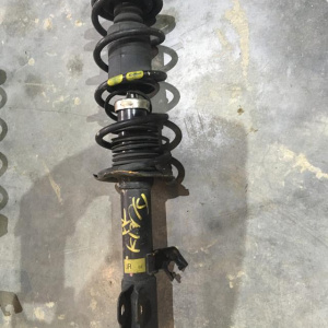 Стойка Nissan K13 March перед, прав