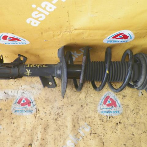 Стойка Nissan J10 Dualis/Qashqai перед, лев 2WD