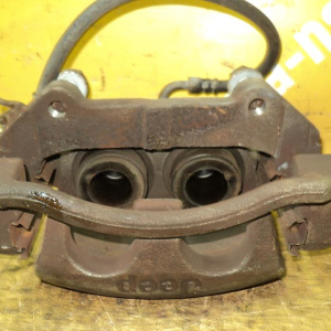 Суппорт Jeep WH/WK EVA '2005-2011 перед, лев 5143693AA 2 поршня Grand Cherokee