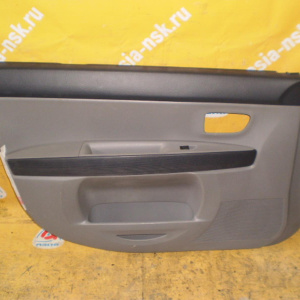 Обшивка двери Mazda Demio DY3W перед, лев