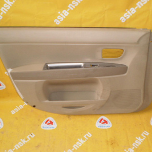 Обшивка двери Mazda Demio DY3W перед, лев