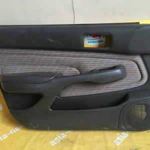 Обшивка двери Toyota Carina ST190 перед, лев