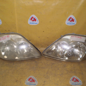 Фара TOYOTA 100-77486 Corolla NZE120 '2001-2004 прав+лев (пара) (ЕВРОСВЕТ) Дефект крепления R фары