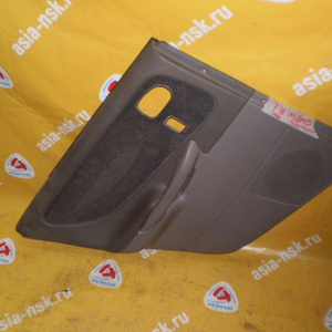 Обшивка двери Mazda Capella GWEW Wagon зад, лев