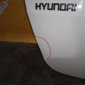 Дверь задняя Hyundai Getz TB/BJ '2002-2010 дворник (дефект #2, вмятины, скол на стекле)