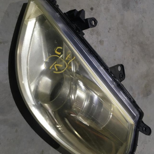 Фара NISSAN P7780 лев Tiida C11