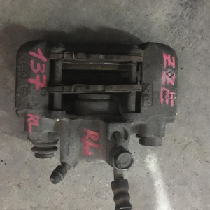 Суппорт Toyota ZZE130 Voltz/Matrix зад, лев