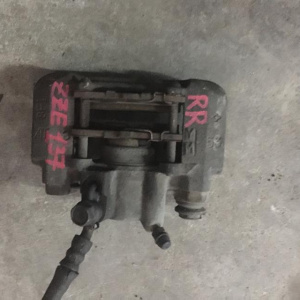 Суппорт Toyota ZZE130 Voltz/Matrix зад, прав