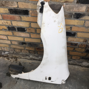 Крыло Toyota Allex/Corolla Fielder/Corolla Runx NZE120 '2000-2004/'2001-2002 перед, лев (с отверстием)