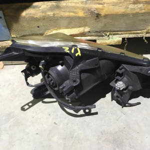 Фара NISSAN 1800 лев Y12 деф.стекла