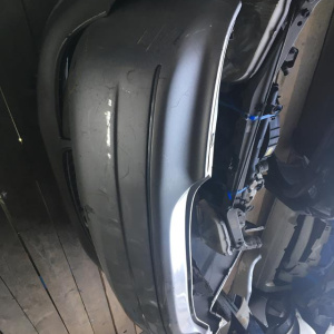 Бампер Toyota Pronard MCX20 зад дефект шпаклевка 52159-AC040