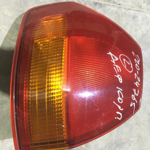 Стоп Nissan 220-24765 L AD/Wingroad Y11 '1999-2002 желт деф.корпуса