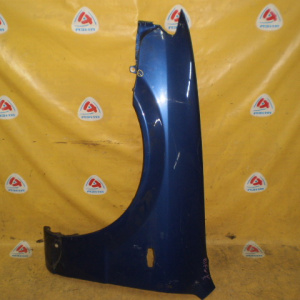 Крыло Mazda Familia BJ3P '2000-2003 перед, лев ф.13-64 Дефект