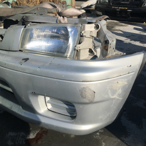 Ноускат Mazda Demio DW3W '08.1996-11.1999 a/t дефект крепления решетки (без габаритов) ф.001-6872