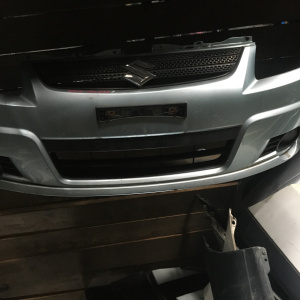 Бампер SUZUKI SX4 YB41S '2006-2012 перед т.P2709 (в сборе) Губа 71711-80J*