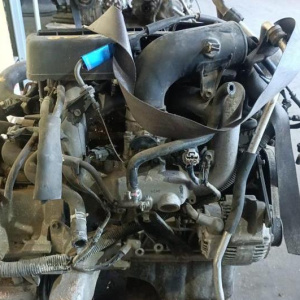 Двигатель Suzuki M18A-1004817 Aerio RD51S