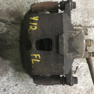 Суппорт NISSAN Y12 перед, лев 5434