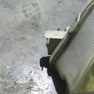 Фара TOYOTA 32-159 лев Camry SV40 дефект крепления