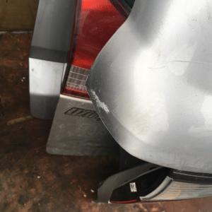 Дверь задняя Mazda Capella GW8W '1997 дефект в. R2267