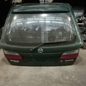 Дверь задняя Mazda Capella GW8W '1997 дефект в. R2267