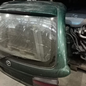 Дверь задняя Mazda Capella GW8W '1997 дефект в. R2267
