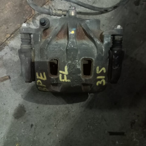Суппорт Subaru BL5/BP5 Legacy перед, лев ПОД ДИСК 315 ММ.