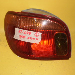 Стоп TOYOTA 52-049 L Vitz NCP10 желт. полоса дефект отражателя