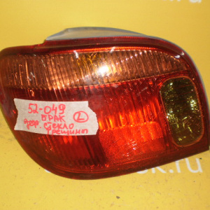 Стоп TOYOTA 52-049 L Vitz NCP10 желт. полоса Брак стекла