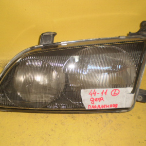 Фара TOYOTA 44-11/44-3 лев Ipsum SXM10 Дефект (плавленная)